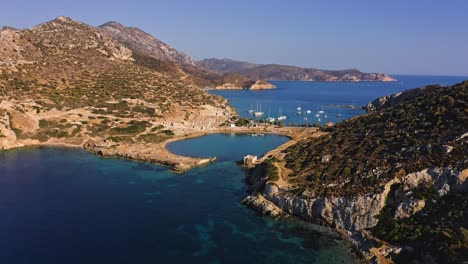Aerial-View-Of-Aegean-Marina-Bay-With-Ancient-Excavations-At-Knidos,-Turkey