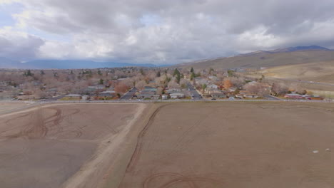 Aerial-panoramic-of-undeveloped-lot-in-front-of-subdivision-in-Reno-Nevada