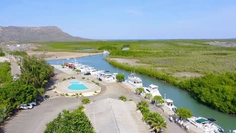 Aerial-View-Of-Luxury-Yachts-At-Club-Nautico-de-Monte-Cristi,-Boat-Club-In-Dominican-Republic