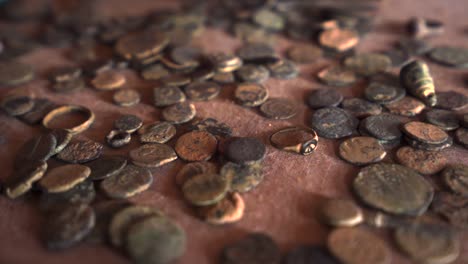 Old-rustic-arabic-coins-in-closeup,-selective-focus