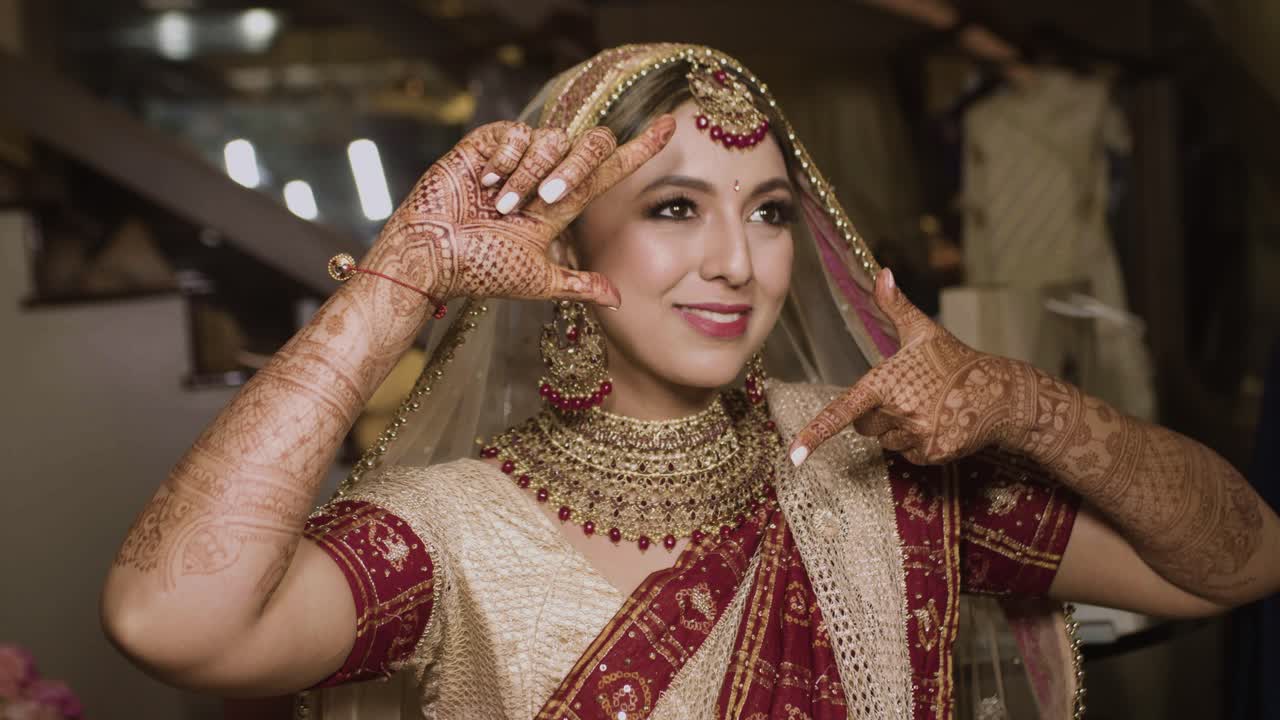 An Elegant, Modern Indian Wedding with a Touch of Harry Potter - Over The  Moon | Indian bride poses, Indian bride photography poses, Indian wedding  poses