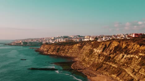 Rising-Over-High-Cliffs-Revealing-Ericeira-Gorgeous-View,-Portugal