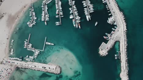 Aerial-shot-by-drone-from-the-marina-in-San-Vito-Lo-Capo,-Sicily,-Italy