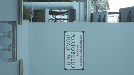 London,-United-Kingdom-Vertical-shot-of-The-sign-of-the-Portobello-Road