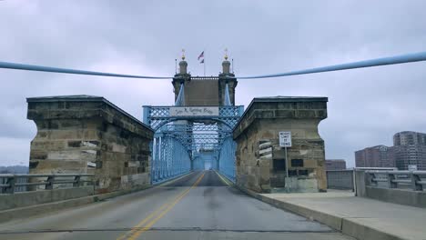 Excellent-Pov-Shot-Of-A-Car-Driving-Over-The-John-Roebling-Bridge-In-Ojai,-California