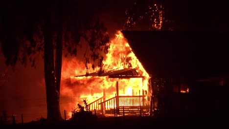 A-House-Is-Engulfed-In-Flames-At-Night-During-The-Disastrous-Dixie-Fire-In-Northern-California