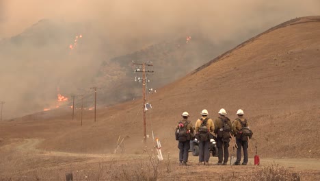 The-Alisal-Fire-Burns-On-A-Hillside-Along-The-Gaviota-Coast-As-Firefighters-Look-On-In-Santa-Barbara-County