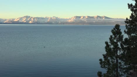 Beautiful-Establishing-Shot-Of-Lake-Tahoe,-California,-Nevada,-Sierras-In-Winter-With-Snow