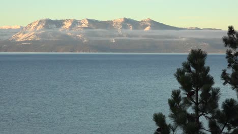 Beautiful-Establishing-Shot-Of-Lake-Tahoe,-California,-Nevada,-Sierras-In-Winter-With-Snow