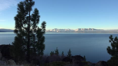 Beautiful-Establishing-Shot-Of-Lake-Tahoe,-California,-Nevada,-Sierras-In-Winter-With-Snow