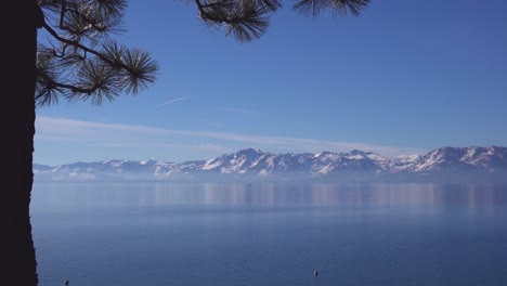 Beautiful-Establishing-Shot-Of-Lake-Tahoe,-California,-Nevada,-Sierras-In-Winter-With-Snow