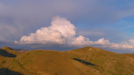 Beautiful-Aerial-Over-Southern-California-Foothills-With-Large-Storm-Thunderheads-Clouds-Looming