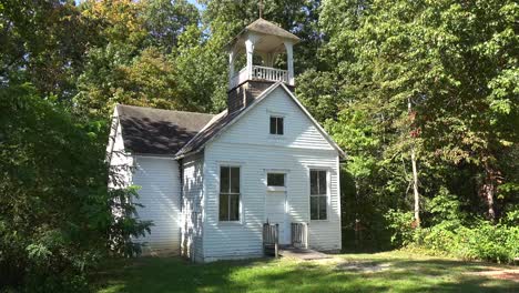 Establishing-Shot-Of-A-One-Room-Schoolhouse-In-The-Countryside