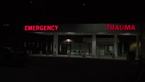 Good-Night-Establishing-Shot-Of-A-Generic-Modern-Hospital-With-Emergency-Room-And-Trauma-Center