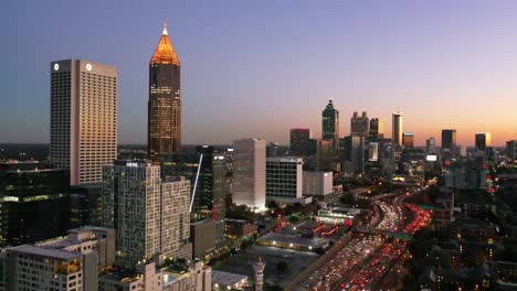 High-Establishing-Aerial-Shot-Of-Atlanta,-Georgia-Downtown-Skyline-At-Dusk,-Sunset-Or-Night