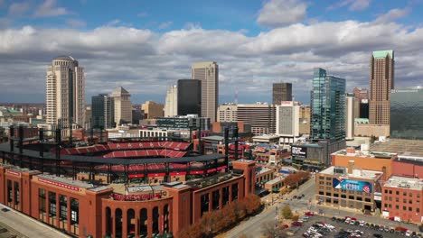 Aerial-Over-Busch-Stadium,-St-Louis,-Missouri,-With-City-Skyline-In-Background