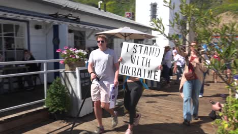 Ukrainian-Antiwar-Protesters-March-On-The-Malibu-Pier-With-Signs-And-Flags-To-Protest-The-Russian-Invasion-Of-Ukraine