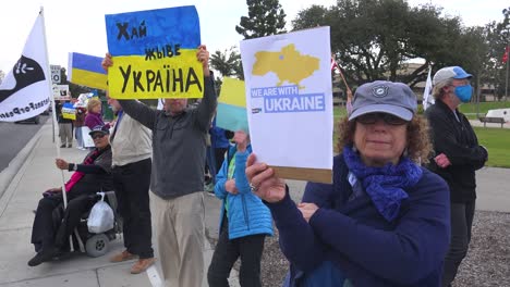 Protesters-Gather-To-Hold-Signs-In-Support-Of-Ukraine-Following-Russia-Invasion