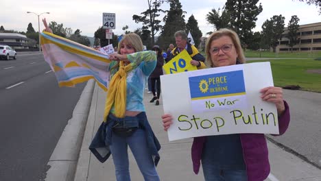 Protesters-Gather-To-Hold-Signs-In-Support-Of-Ukraine-Following-Russia-Invasion