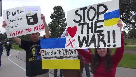 A-Pacifist-Raises-A-Sign-Saying-Stop-The-War-During-A-Protest-Of-Russia-Invasion-Of-Ukraine