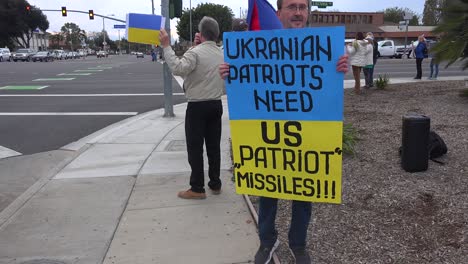 Protesters-Gather-To-Hold-Signs-In-Support-Of-Ukraine-Following-Russia-Invasion