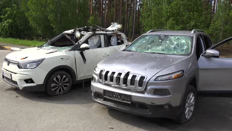 Cars-Are-Riddled-With-Bullet-Holes-Along-A-Street-In-Irpin-Ukraine-During-The-Russian-Occupation