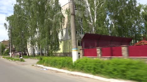 Pov-From-As-Car-Passing-Borodianka,-Borodyanka,-Ukraine-With-Bombed-And-Rocketed-Apartment-Buildings-Where-Hundreds-Were-Killed-By-Russian-Occupation