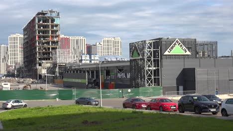 Establishing-Shot-Of-The-Destroyed-Retroville-Shopping-Mall-And-Leroy-Merlin-Store-Hit-By-Russian-Rocket-In-Downtown-Kyiv,-Kiev-Ukraine