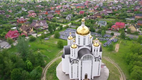 Aerial-Of-The-Church-Of-St-Andrew-Pervozvannoho-All-Saints-In-Bucha,-Ukraine-Where-Dozens-Of-Unmarked-Graves-And-War-Crimes-Victims-Were-Unearthed