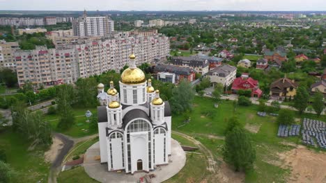 Aerial-Of-The-Church-Of-St-Andrew-Pervozvannoho-All-Saints-In-Bucha,-Ukraine-Where-Dozens-Of-Unmarked-Graves-And-War-Crimes-Victims-Were-Unearthed