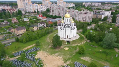 Aerial-Of-The-Church-Of-St-Andrew-Pervozvannoho-All-Saints-In-Bucha,-Ukraine-Where-Dozens-Of-Unmarked-Graves-And-War-Crimes-Victims-Were-Unearthed