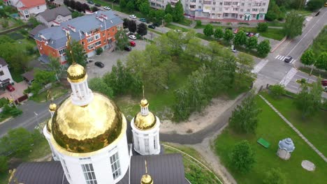 Aerial-Of-The-Church-Of-St-Andrew-Pervozvannoho-All-Saints-In-Bucha,-Ukraine-Where-Dozens-Of-Unmarked-Graves-And-War-Crimes-Victims-Were-Unearthed