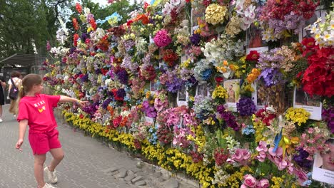 A-Large-Flowered-Memory-Wall-Of-Fallen-Ukrainian-War-Heroes-Killed-By-Russian-Aggression-Along-A-Main-Street-In-Lviv,-Ukraine