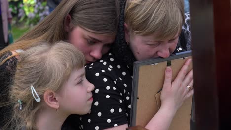 A-Wife-Says-Goodbye-To-Her-Soldier-Husband-At-His-Funeral-During-The-War-In-Ukraine