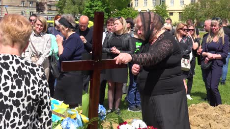 A-Mother-Mourns-At-The-Grave-Of-Her-Son-During-The-Funeral-For-A-Ukrainian-Soldier-During-The-War-In-Ukraine