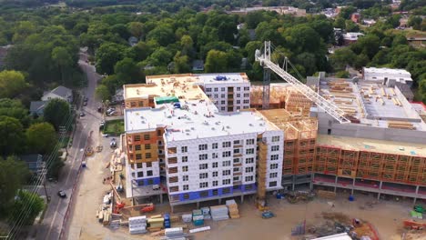 Good-Aerial-Over-A-Large-Construction-Site-With-Crane-And-Workers