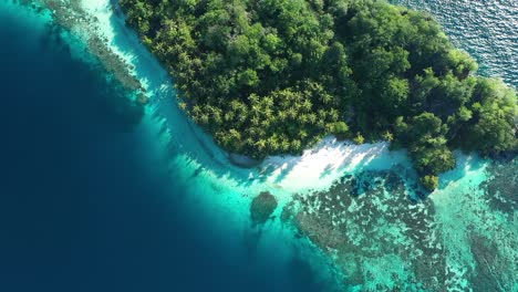 Excellent-Overhead-Aerial-Shot-Of-A-Remote-Island-In-Raja-Ampat,-Indonesia