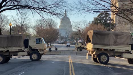 National-Guard-Troops-Patrol-The-Capitol-Washington-Dc-Following-The-Trump-Insurrection-And-Riots,-Military-Trucks-Block-The-Streets