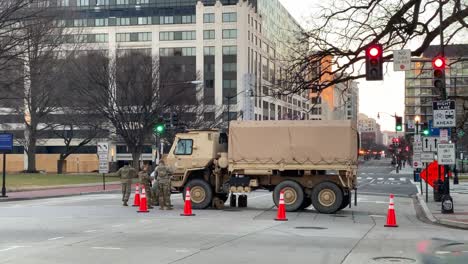 National-Guard-Troops-Patrol-The-Capitol-Washington-Dc-Following-The-Trump-Insurrection-And-Riots,-Military-Trucks-Block-The-Streets