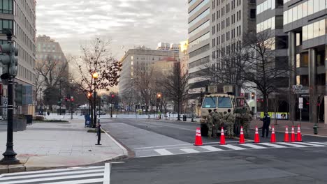 National-Guard-Troops-Patrol-The-Capitol-Washington-Dc-Following-The-Trump-Insurrection-And-Riots,-Military-Trucks-Block-The-Streets