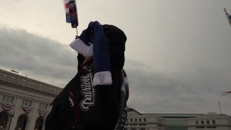 Heavy-Set-Man-Wearing-President-Elect-Donald-Trump-Memorabilia-During-The-Presidential-Inauguration,-Washington