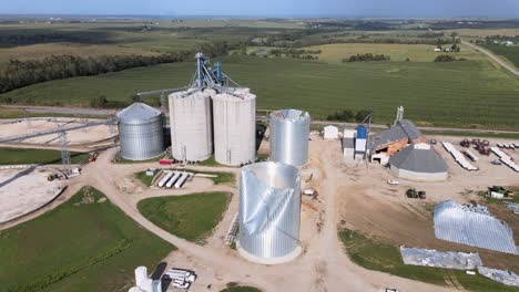 Aerial-Drone-Footage-Storm-Damaged-Grain-Elevators-Destroyed-By-High-Winds-And-Bad-Weather,-Midwest-Farm-Country,-Iowa