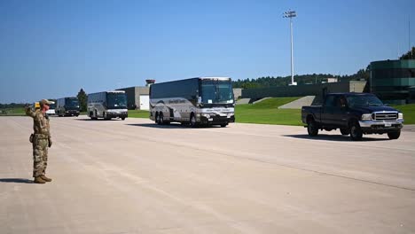 First-Afghanistan-Refugees-Arrive-In-America,-At-Volk-Field-Air-Base-In-Wisconsin