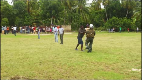 Port-Au-Prince,-Haiti-Us-Military-Personnel-Pick-Up-And-Deliver-Boxes-Of-Food-To-Haitian-Citizens-During-A-Humanitarian-Aid-Mission-Supporting-The-Us-Agency-For-International-Development-(Usaid)