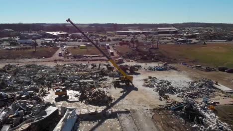 Aerial-Emergency-Rescue-Workers-Search-Rubble-Of-Mayfield-Consumer-Products-Candle-Factory-After-It-Was-Destroyed-During-A-Massive-Tornado-In-Kentucky