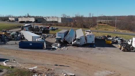 Aerial-Emergency-Rescue-Workers-Search-Rubble-Of-Mayfield-Consumer-Products-Candle-Factory-After-It-Was-Destroyed-During-A-Massive-Tornado-In-Kentucky