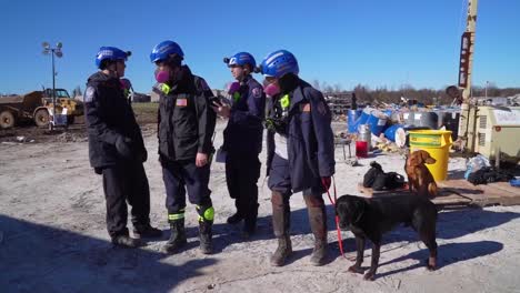 Emergency-Rescue-Workers-Use-Cadaver-Dogs-To-Search-Rubble-Of-Mayfield-Consumer-Products-Candle-Factory-After-It-Was-Destroyed-During-A-Massive-Tornado-In-Kentucky