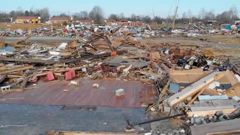 Aerial-Of-Tornado-Damage-And-The-Shocking-Destruction-Of-A-Factory-In-The-Town-Of-Dawson-Springs,-Kentucky