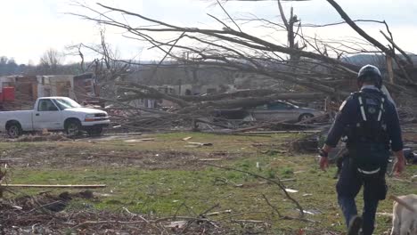 Emergency-Search-And-Rescue-Workers-Use-Cadaver-Dogs-To-Search-Rubble-Of-Dawson-Springs-After-It-Was-Destroyed-During-A-Massive-Tornado-In-Kentucky