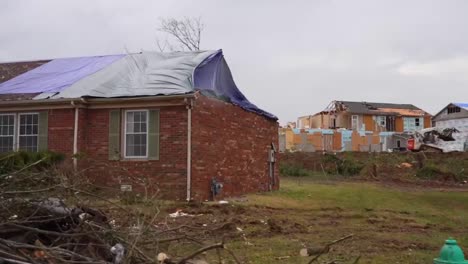 Massive-Damage-Is-Seen-To-Homes,-Houses-And-Neighborhoods-In-Bowling-Green-Kentucky-Following-A-Terrible-Tornado-Outbreak